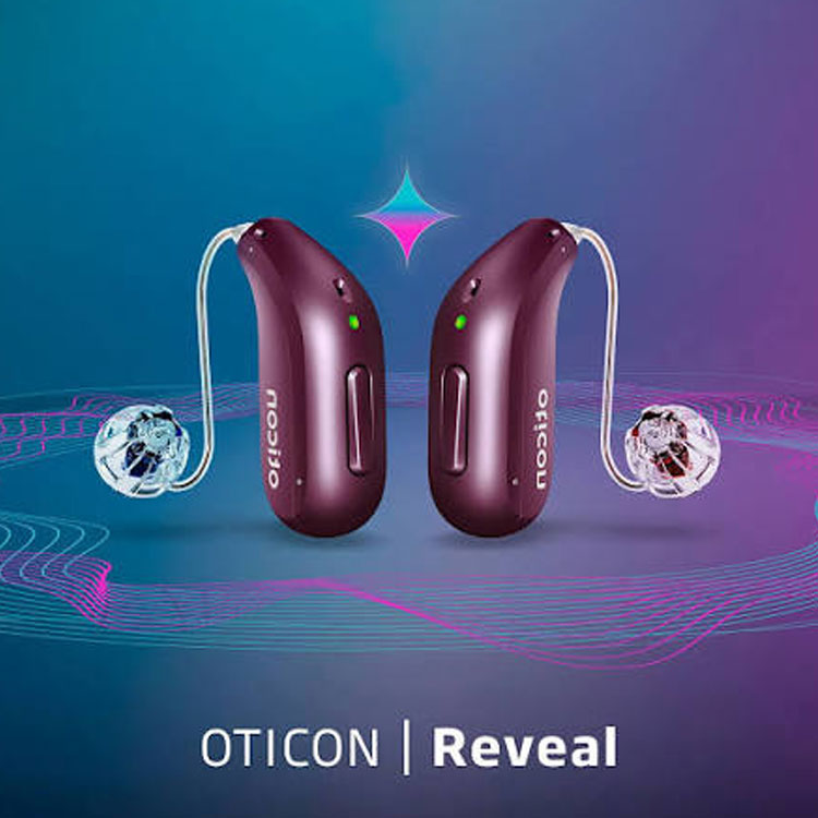 Oticon Reveal hearing aids in burgundy.